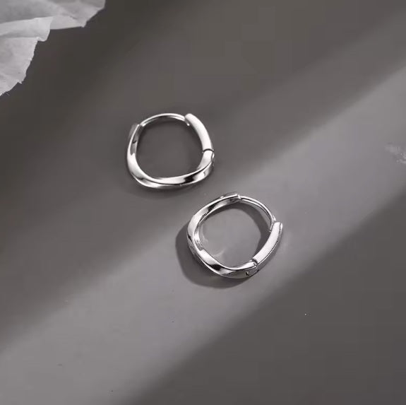 Ohrringe aus 925er Sterling-Silber, wellige Creolen