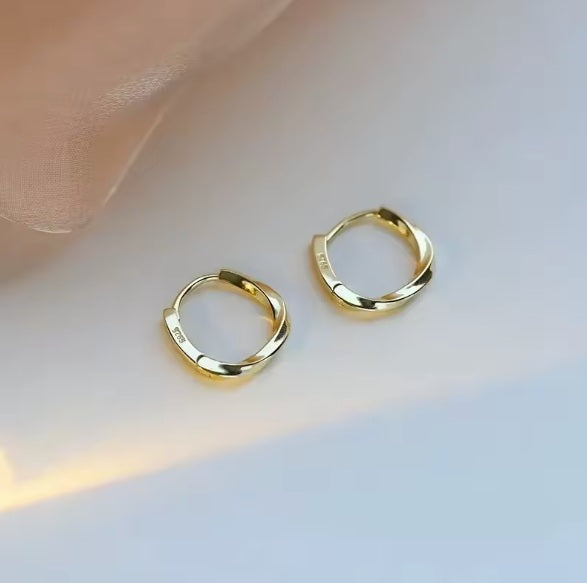 Ohrringe aus 925er Sterling-Silber, wellige Creolen