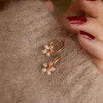 Ohrringe aus 925er Sterling-Silber, hängendes Blümchen mit Zirkonia