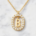 Kette mit Anhänger aus 925er Sterling-Silber, verschiedene Buchstaben im Strasskreis, 45cm