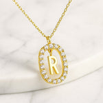 Kette mit Anhänger aus 925er Sterling-Silber, verschiedene Buchstaben im Strasskreis, 45cm