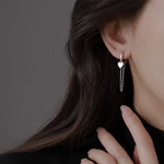 Ohrringe aus 925er Sterling-Silber, fesselndes Herz mit Zirkonia