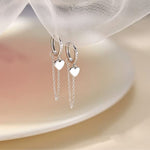 Ohrringe aus 925er Sterling-Silber, fesselndes Herz mit Zirkonia